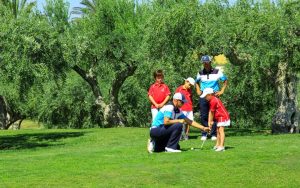 Family golfing at Verdura Resort